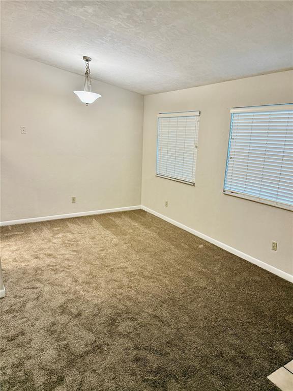 6745 Southwest 45th Avenue Gainesville, FL 32608 - Photo 6 of 12 wooden floor in an empty room