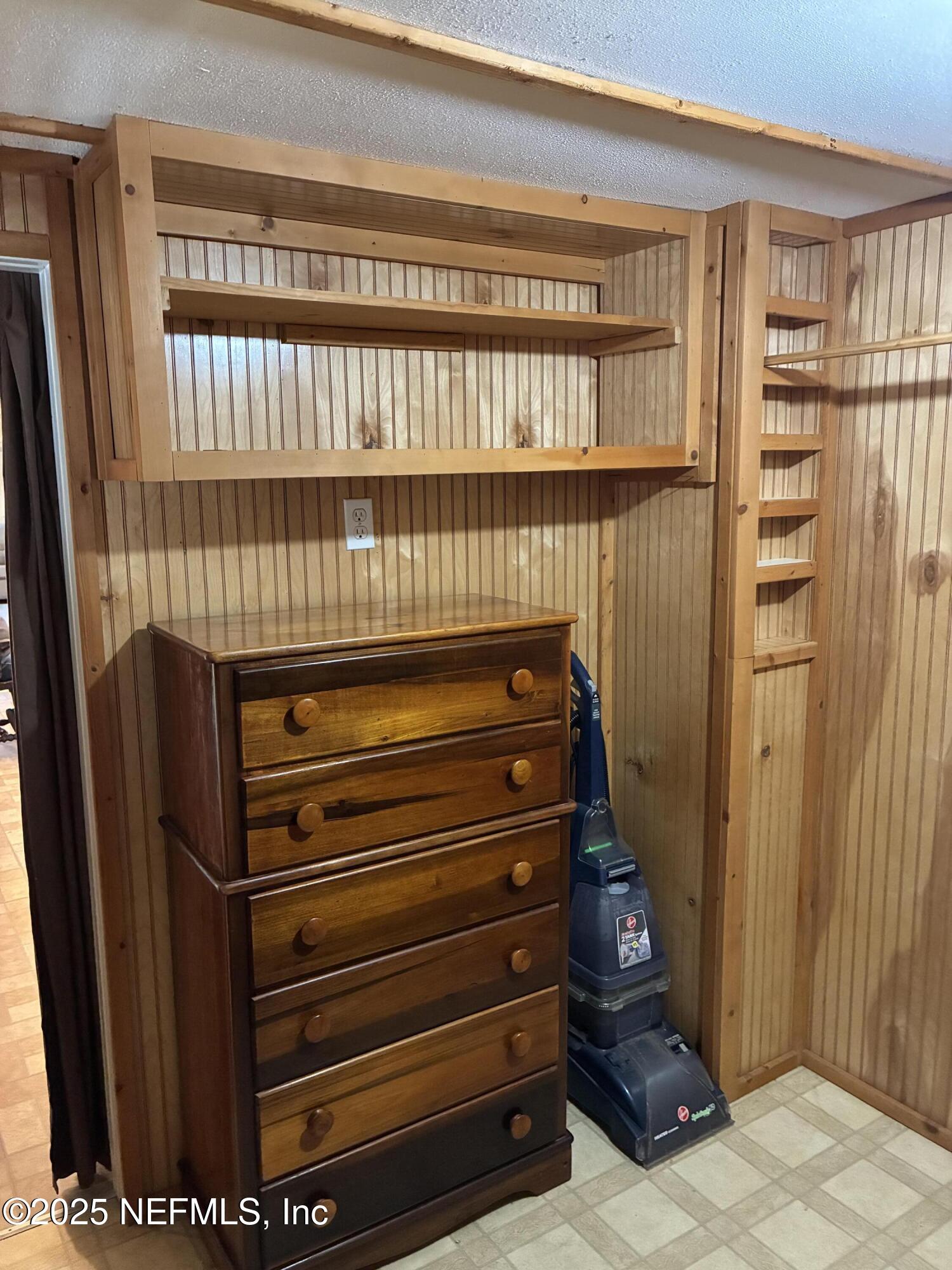 15690 Sears Road Jacksonville, FL 32218 - Photo 21 of 39 a room with a furniture and a window