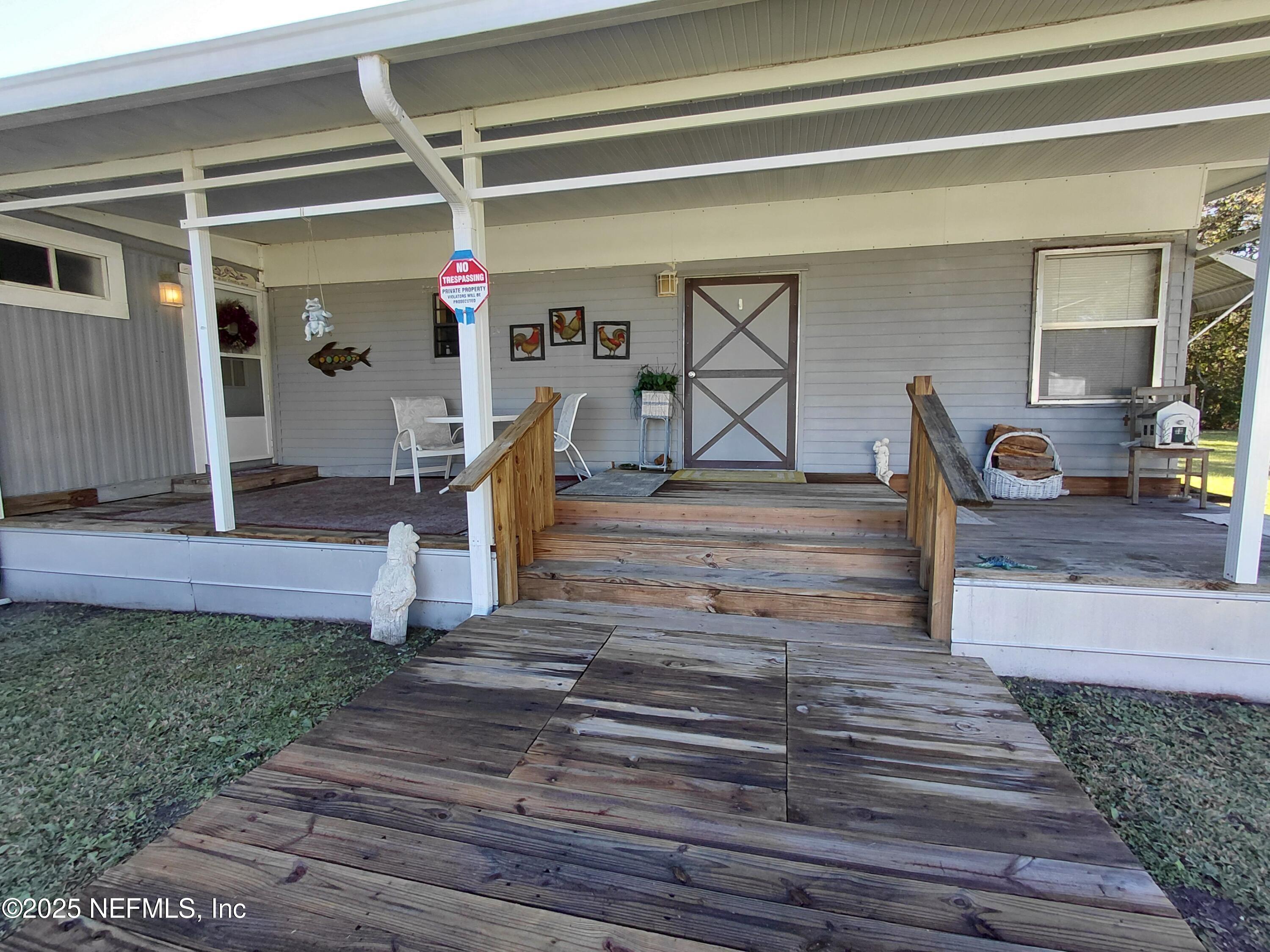 15690 Sears Road Jacksonville, FL 32218 - Photo 26 of 39 Side Patio v2