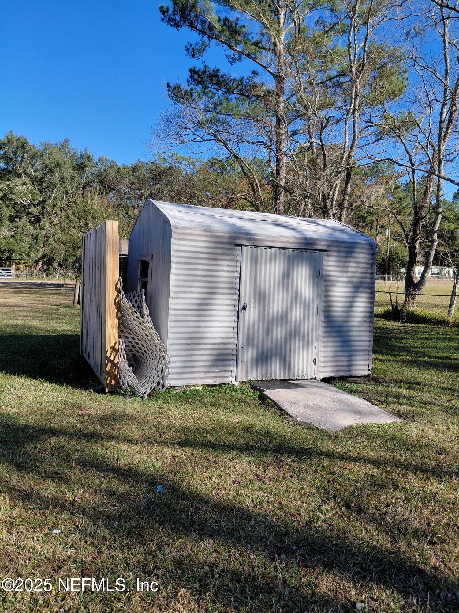 15690 Sears Road Jacksonville, FL 32218 - Photo 34 of 39 a view of a backyard