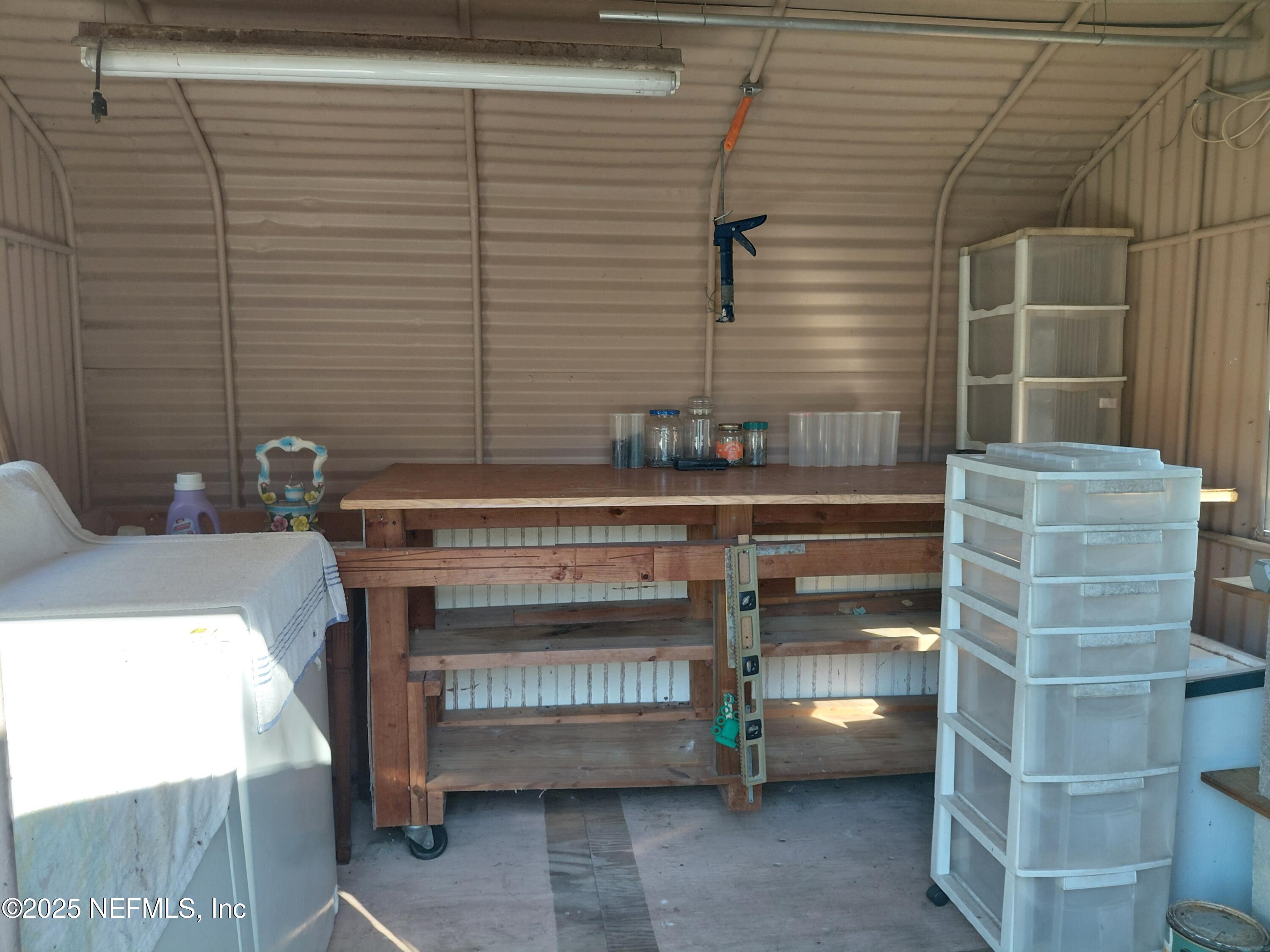 15690 Sears Road Jacksonville, FL 32218 - Photo 36 of 39 a bathroom with a sink and a window