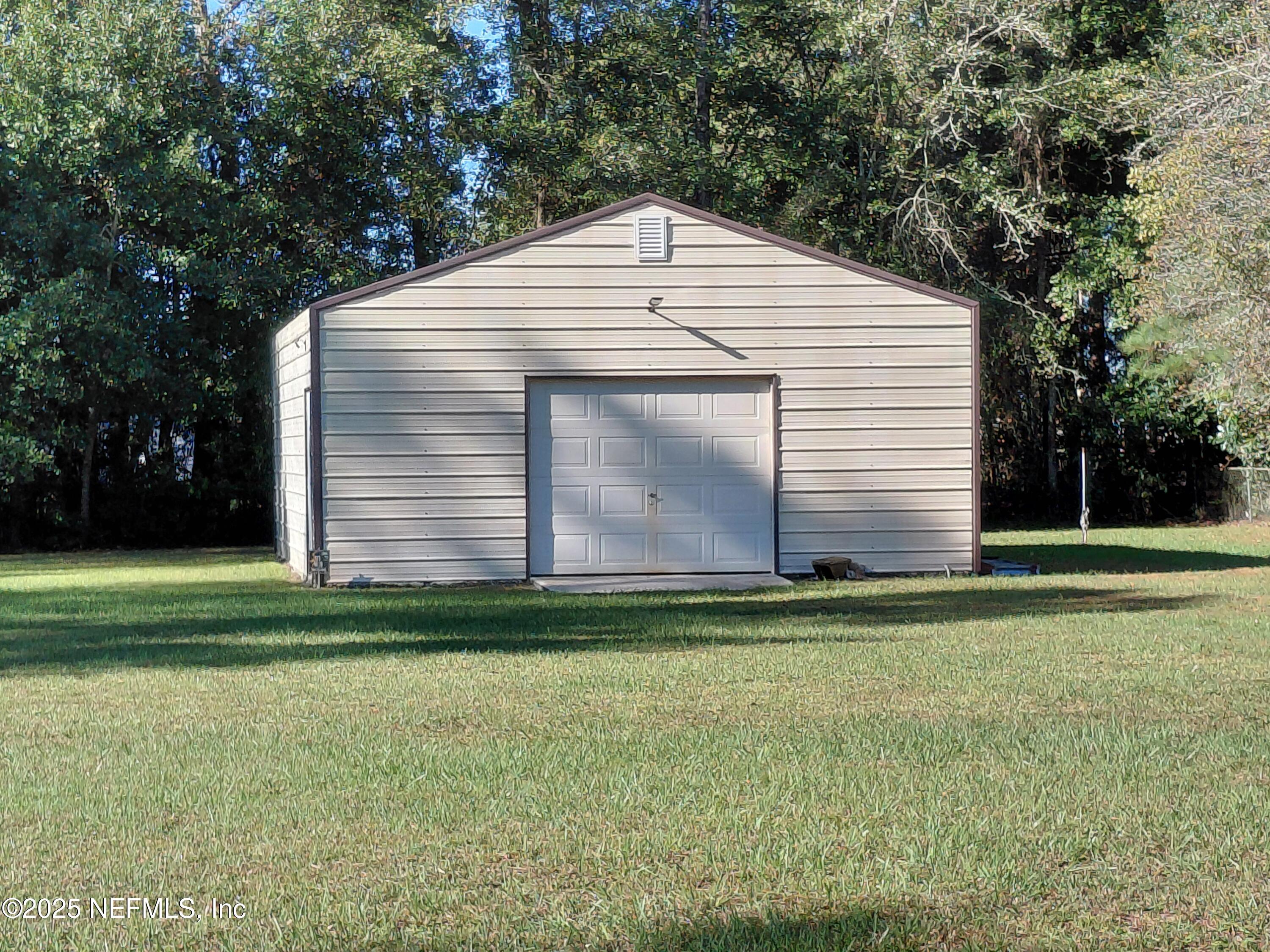 15690 Sears Road Jacksonville, FL 32218 - Photo 37 of 39 a front view of house with yard
