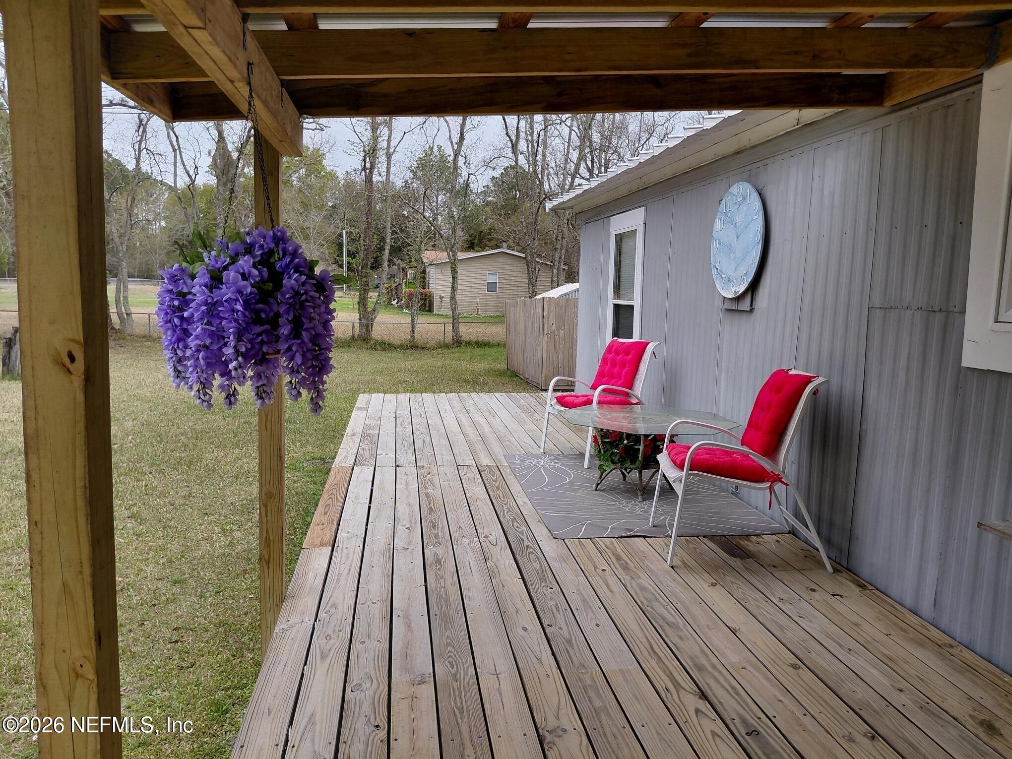 15690 Sears Road Jacksonville, FL 32218 - Photo 5 of 39 Front Patio