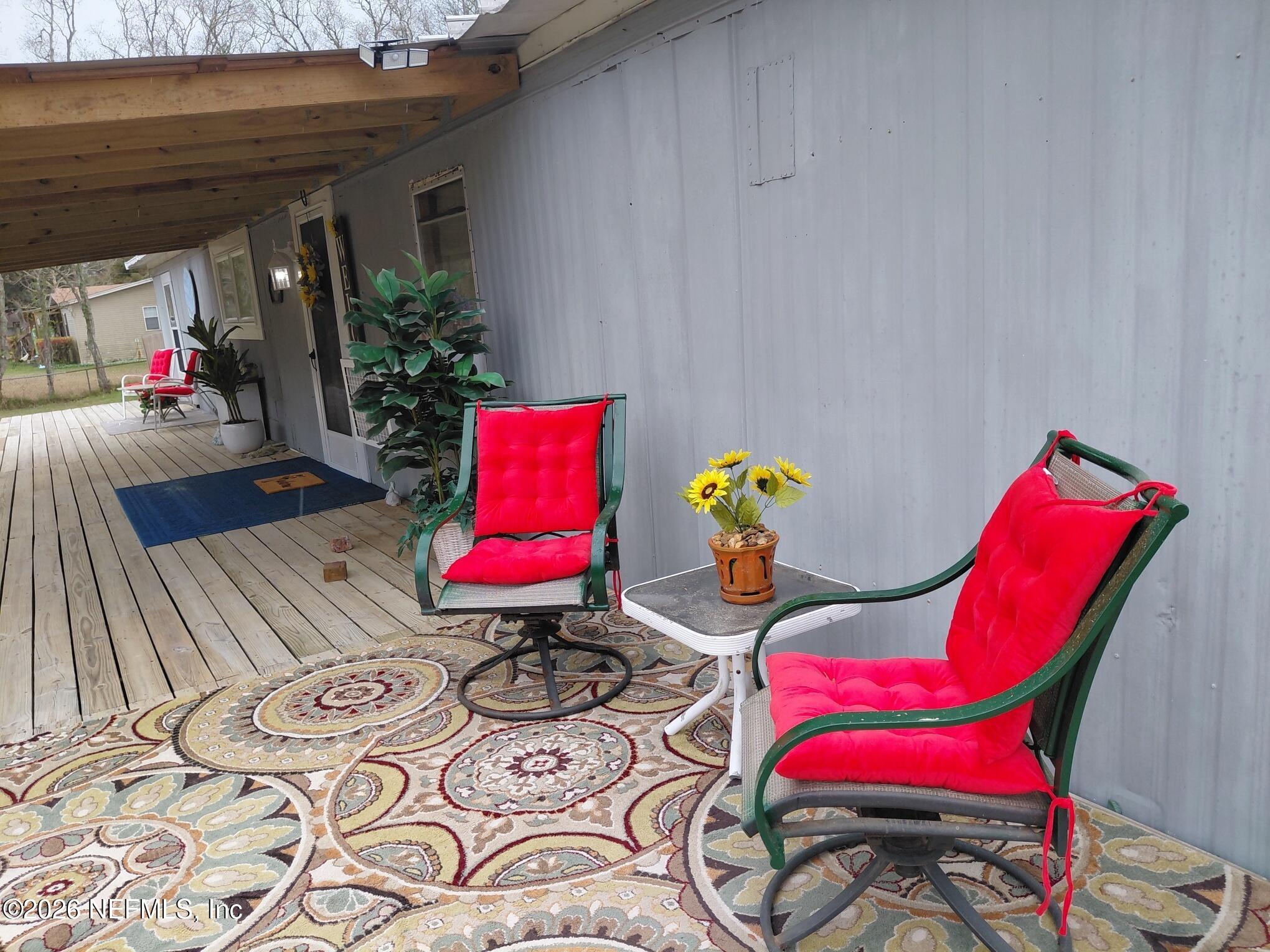 15690 Sears Road Jacksonville, FL 32218 - Photo 6 of 39 Front patio 2