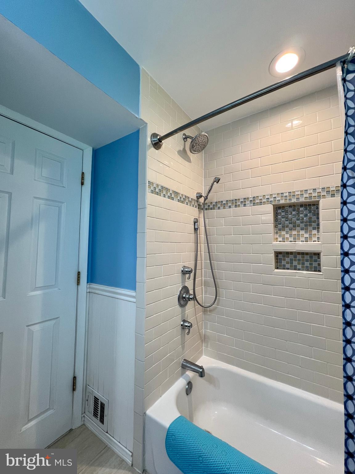 7604 Hogarth Street Springfield, VA 22151 - Photo 22 of 37 Updated tiling is bathroom