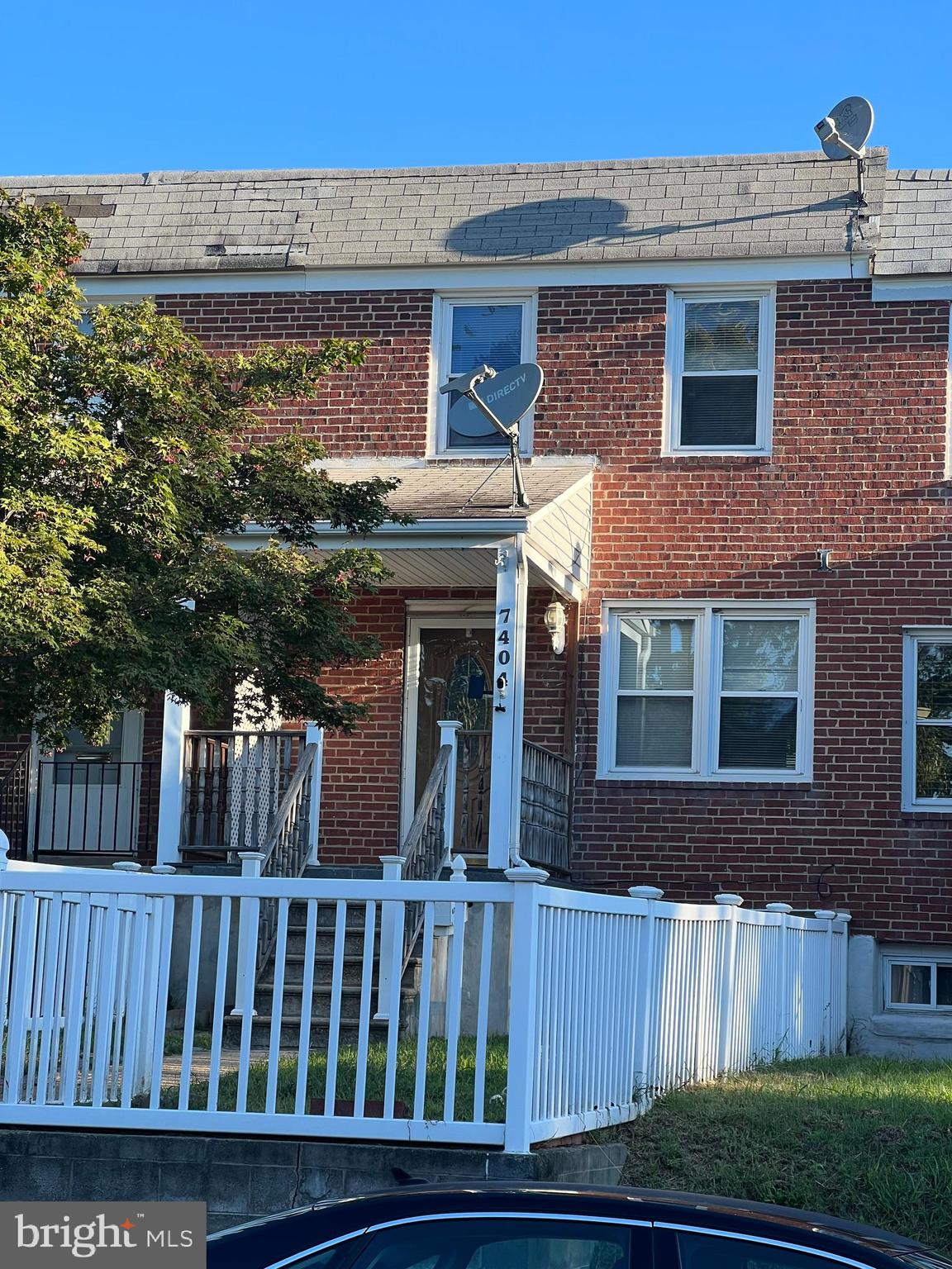 a front view of a house with a porch