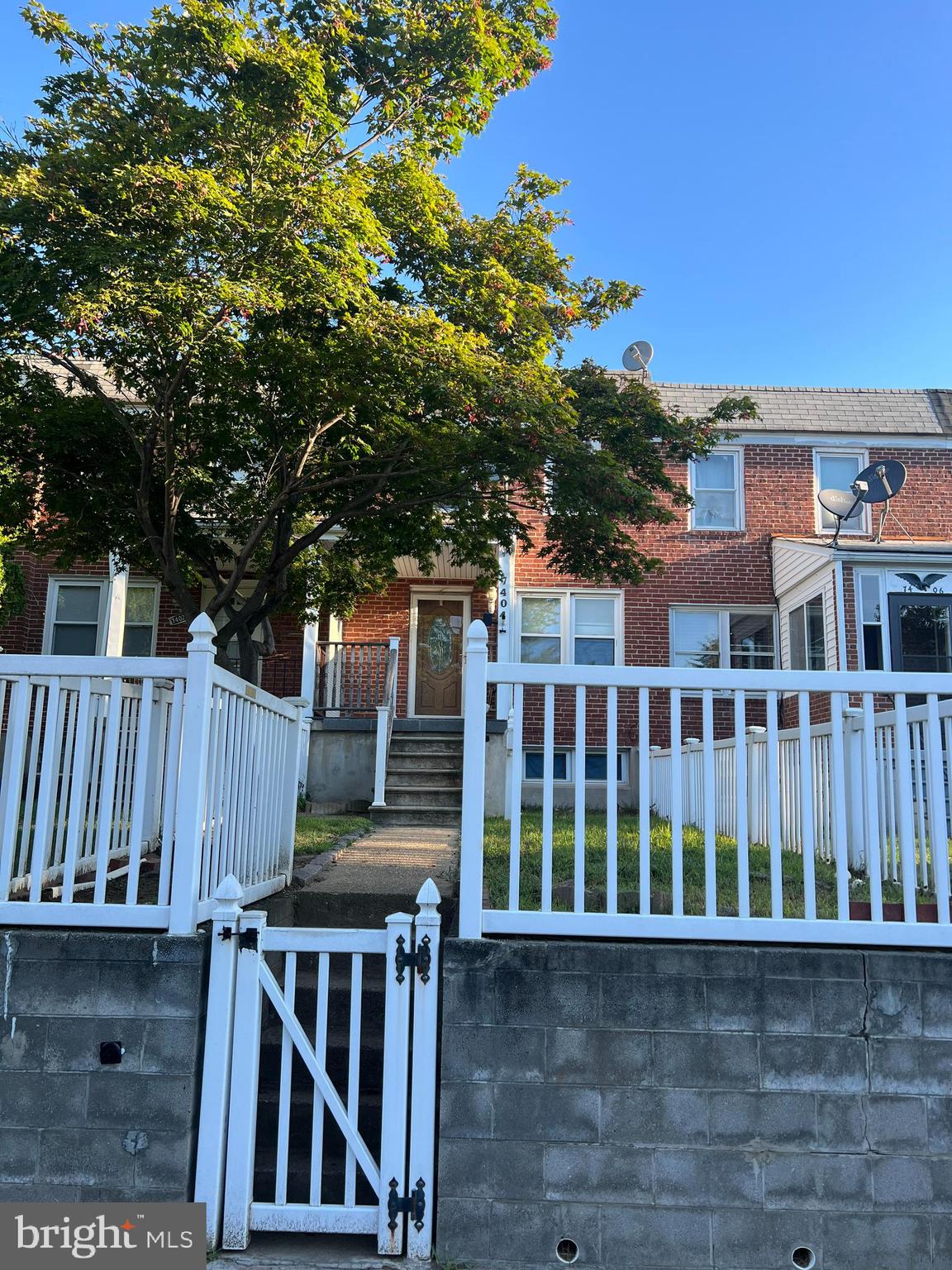 7404 Kirtley Road Baltimore, MD 21222 - Photo 2 of 16 a view of a house with backyard and deck