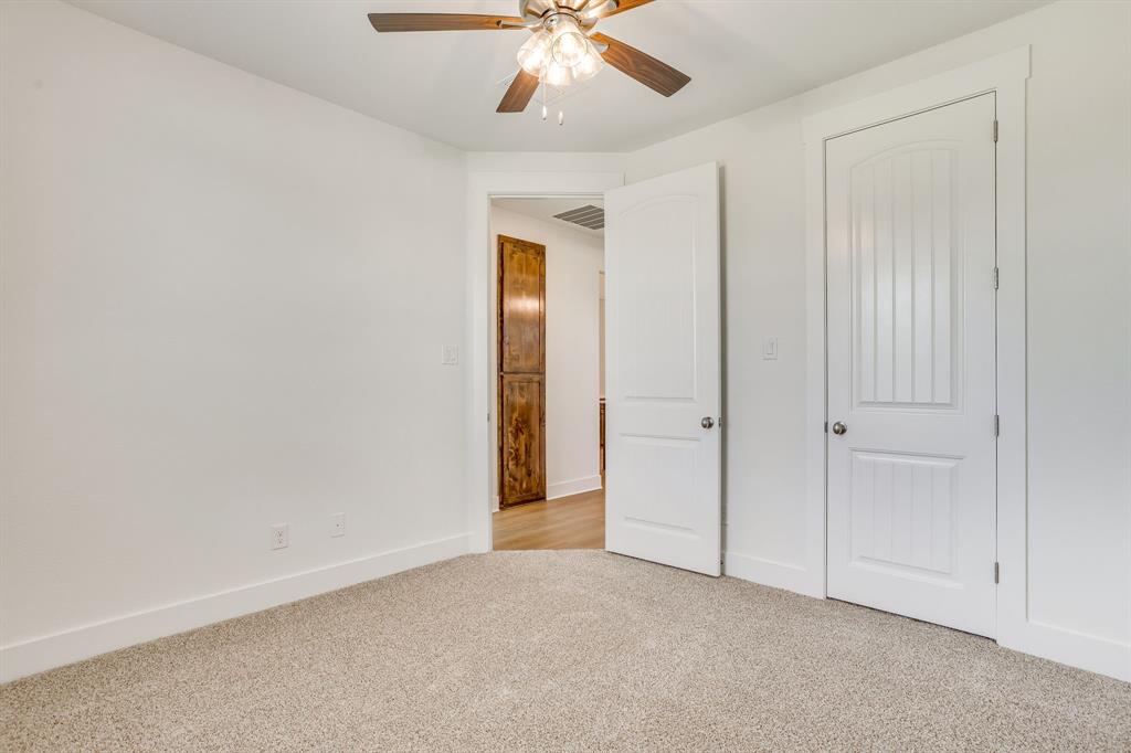 10611 Rye Bread Lane Venus, TX 76084 - Photo 29 of 36 Carpet flooring, white walls, and a ceiling fan with light fixture