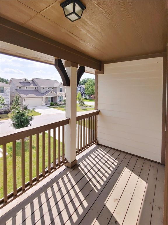 9303 McKnight Loop Austin, TX 78717 - Photo 14 of 18 a view of a balcony with wooden floor