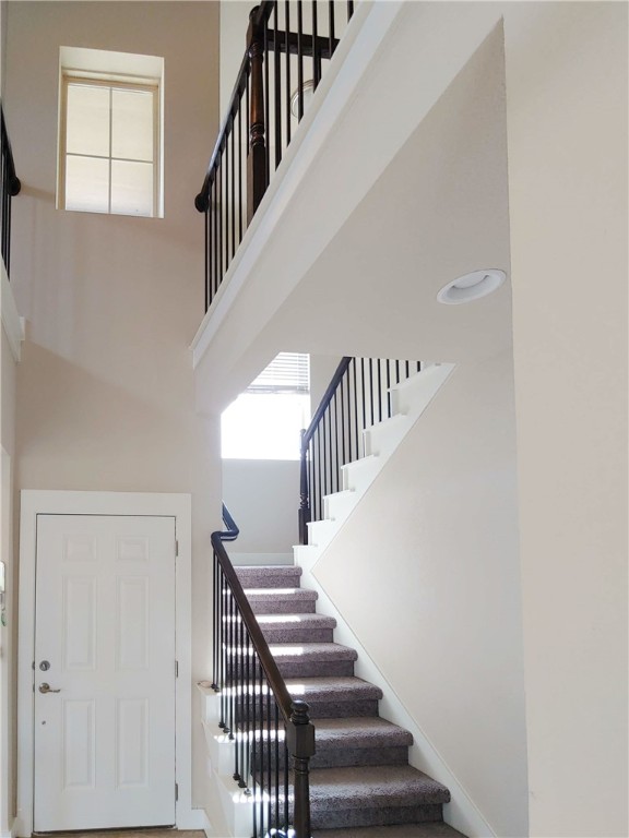 9303 McKnight Loop Austin, TX 78717 - Photo 2 of 18 a view of entryway and hall with wooden floor