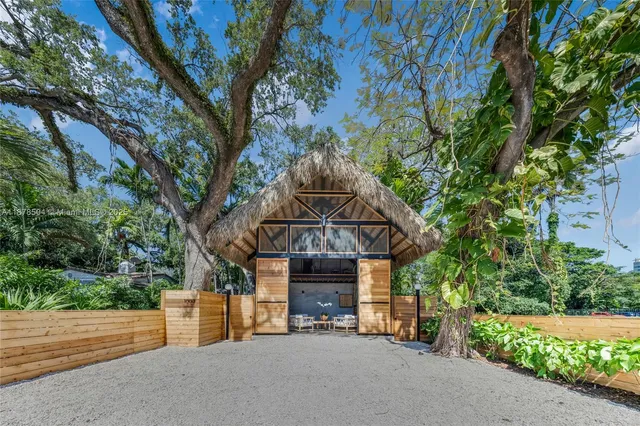 an outdoor space with lots of trees