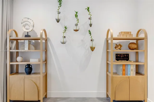 a view of storage and utility room with a window