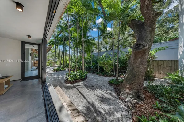 a view of a backyard of a house