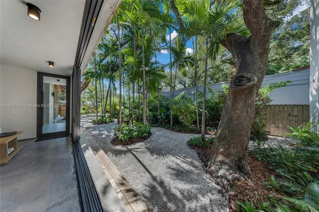 a view of a backyard of a house