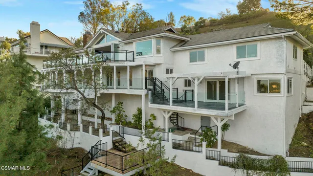 a front view of a house with a porch