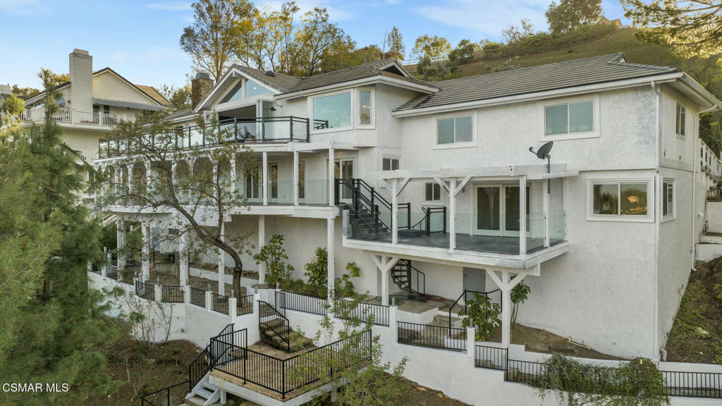 a front view of a house with a porch