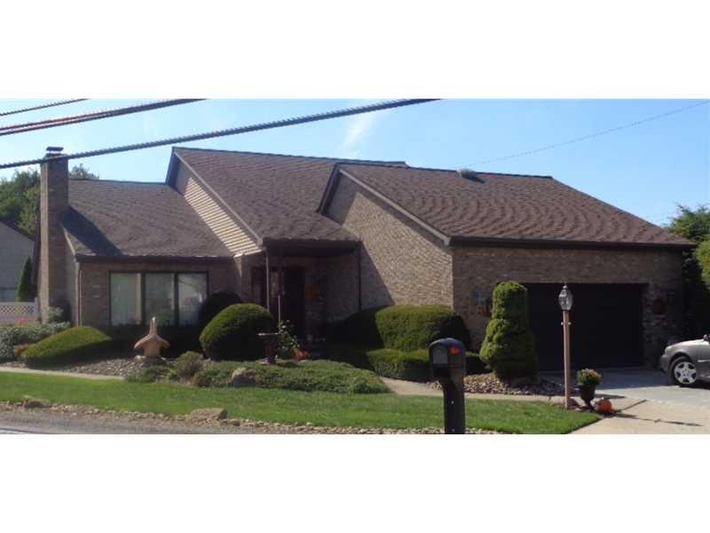 Exterior Front. Great Curb Appeal! All Brick, with minimal maintenance. Attractive Landscaping.  Paved Drive.