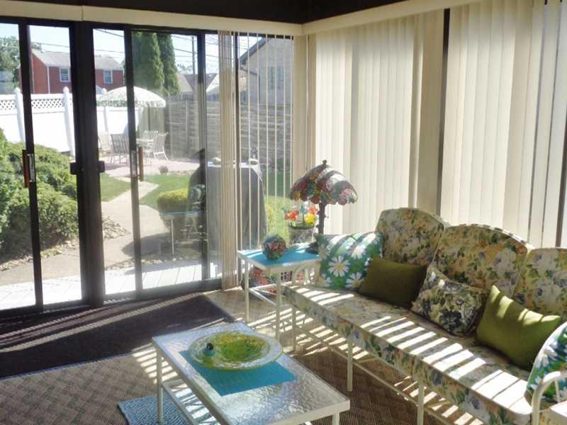 41 Coraopolis Road Coraopolis, PA 15108 - Photo 16 of 20 Sunroom. Beautiful, Bright Sun Room, with access to Back Yard. Trex Deck Steps, Indoor-Outdoor Carpeting, Vertical Blinds, Large Windows.