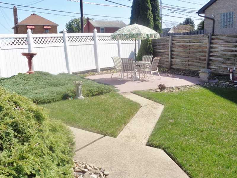 41 Coraopolis Road Coraopolis, PA 15108 - Photo 17 of 20 Exterior Back. Private, fenced Back Yard, with attractive Landscaping.