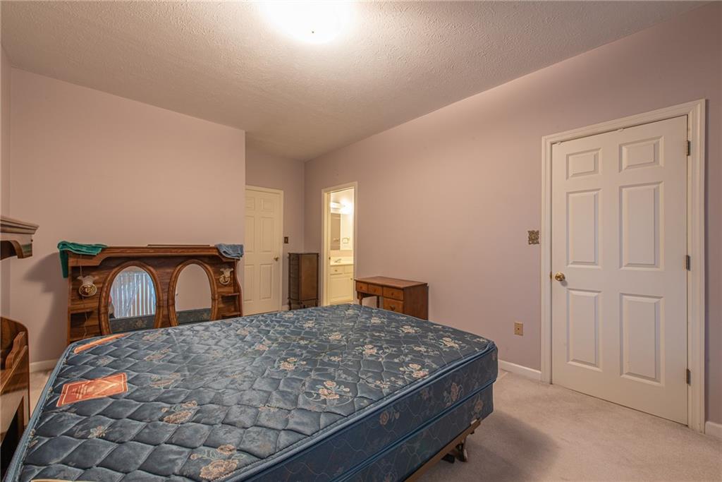 61 David Drive Lower Burrell, PA 15068 - Photo 16 of 29 a bedroom with a bed and a dresser