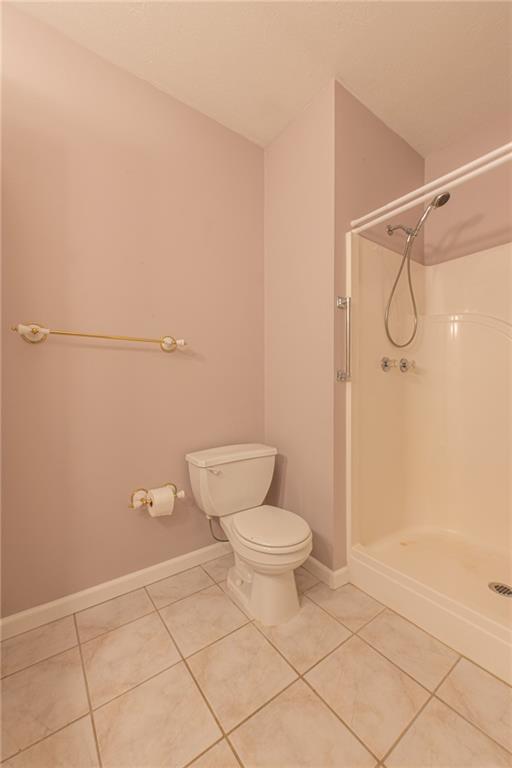 61 David Drive Lower Burrell, PA 15068 - Photo 18 of 29 a bathroom with a toilet and a shower