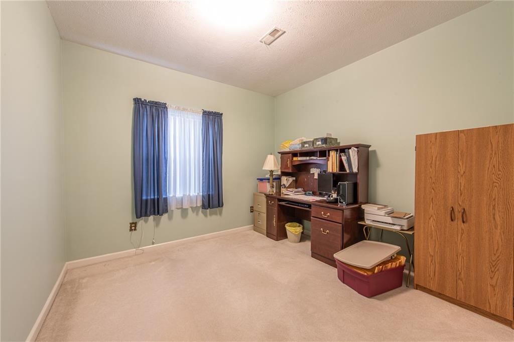 61 David Drive Lower Burrell, PA 15068 - Photo 21 of 29 a room with furniture and musical instruments