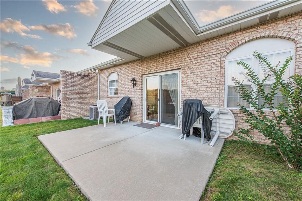 61 David Drive Lower Burrell, PA 15068 - Photo 26 of 29 a view of a patio with a table and chairs and a barbeque