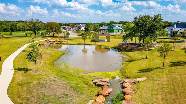 a view of a swimming pool with an outdoor seating