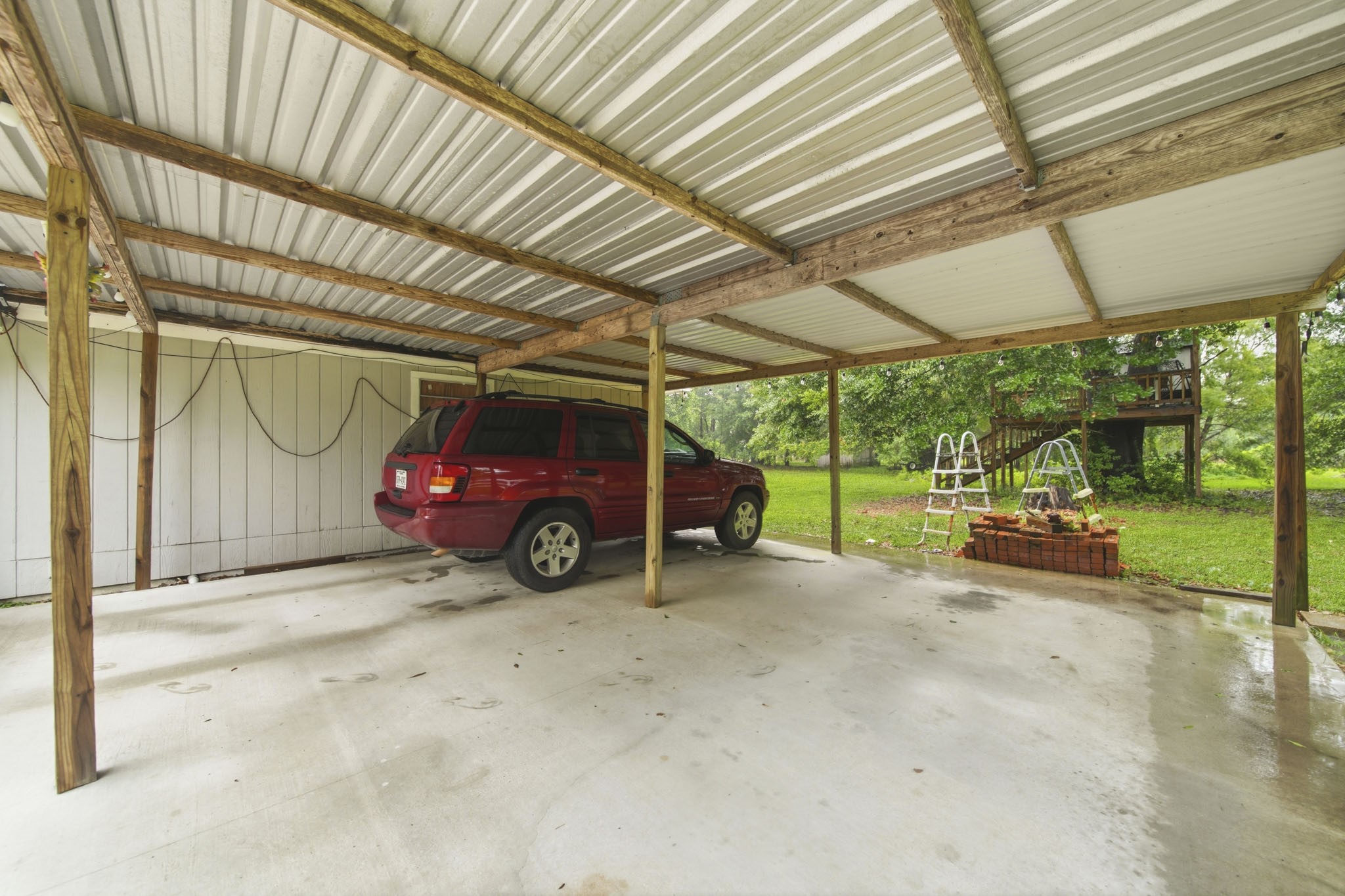 731 Meneley Road Winnie, TX 77665 - Photo 26 of 27 a view of a cars parking space