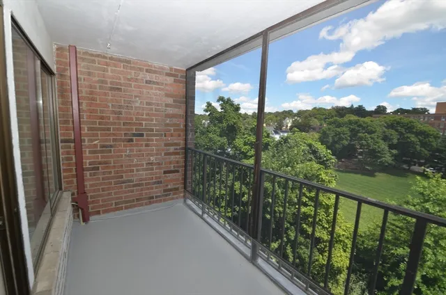 a view of a balcony with an outdoor space