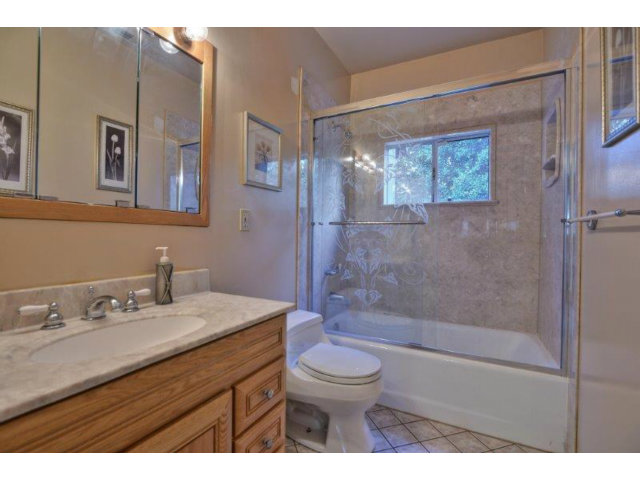 3852 Higuera Road San Jose, CA 95148 - Photo 16 of 25 a bathroom with a sink a toilet and shower