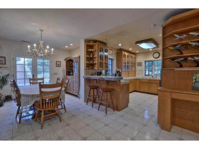3852 Higuera Road San Jose, CA 95148 - Photo 7 of 25 a view of a dining room with furniture and chandelier