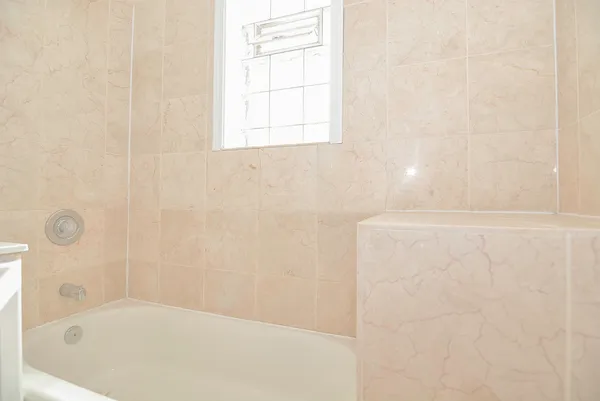 a bathroom with a bathtub