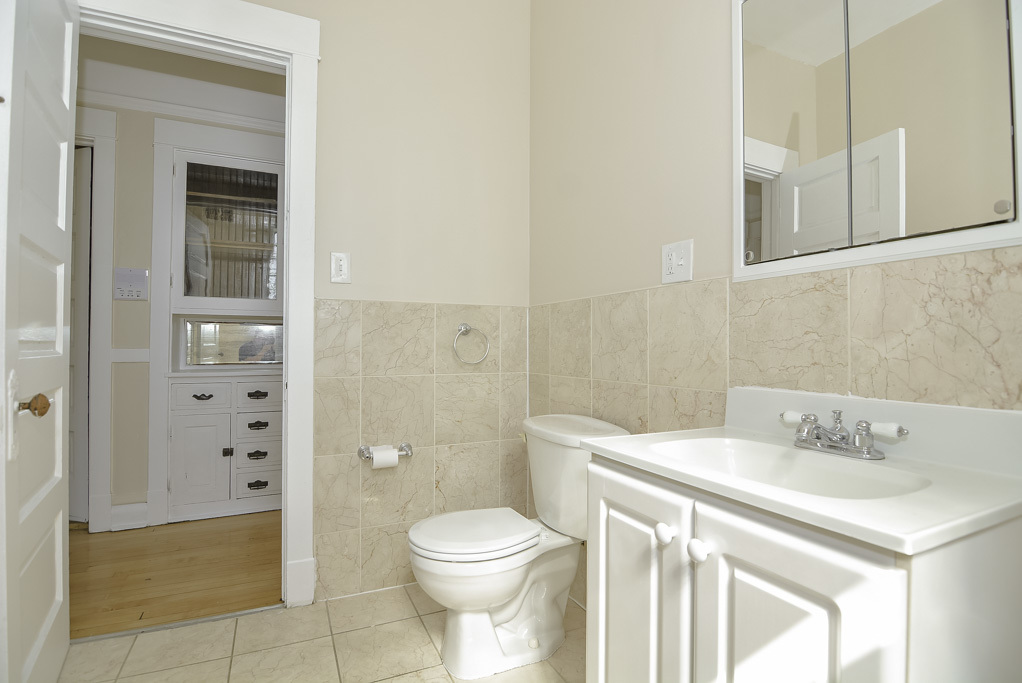 2230 West Iowa Street, Unit 3 Chicago, IL 60622 - Photo 17 of 19 a bathroom with a sink a toilet and shower