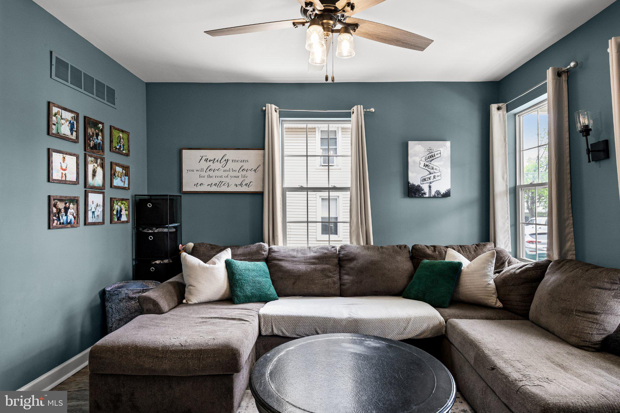 314 Washington Street Delanco, NJ 08075 - Photo 5 of 39 Cozy living space with vibrant walls.