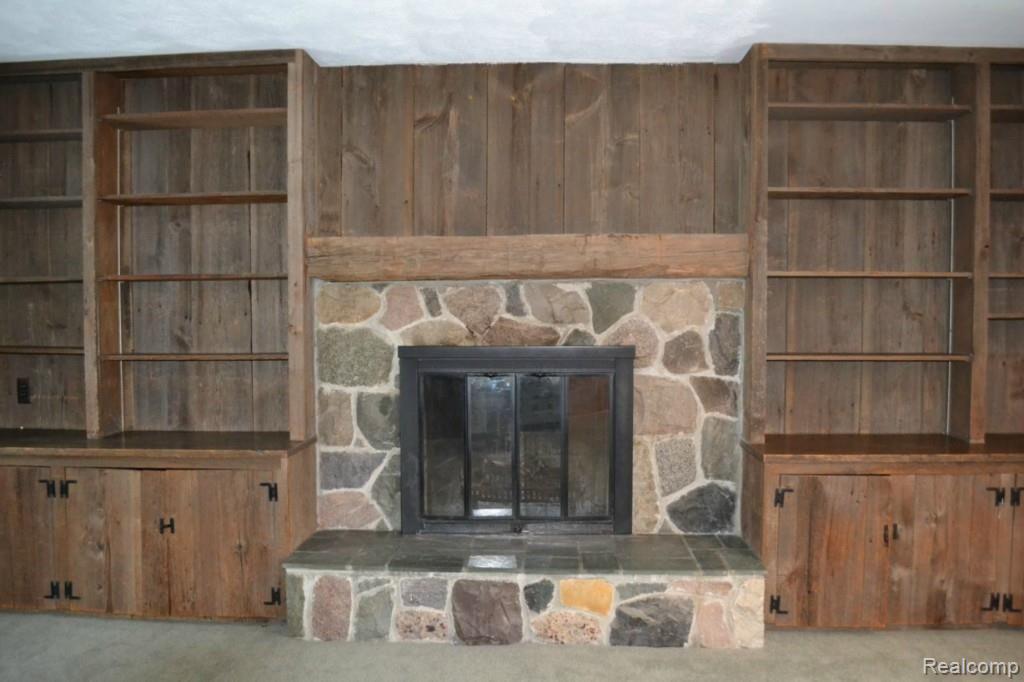 580 Covington Road Bloomfield Hills, MI 48301 - Photo 8 of 15 Natural Stone Fireplace In Family Room