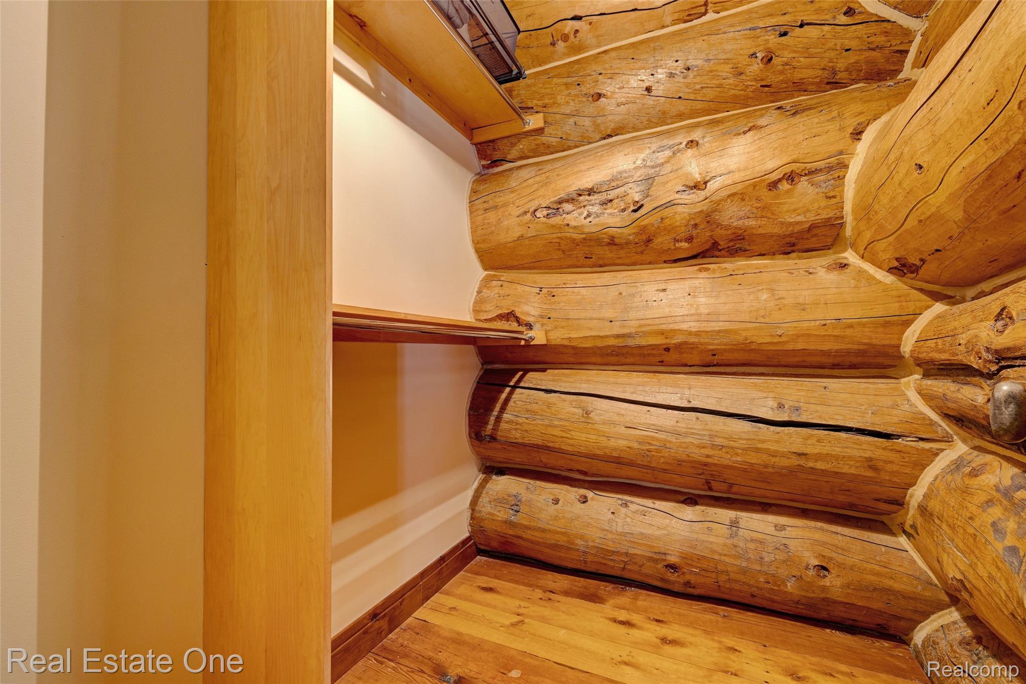 4340 Lahring Road Holly, MI 48442 - Photo 36 of 89 Walk in closet with light wood-style flooring