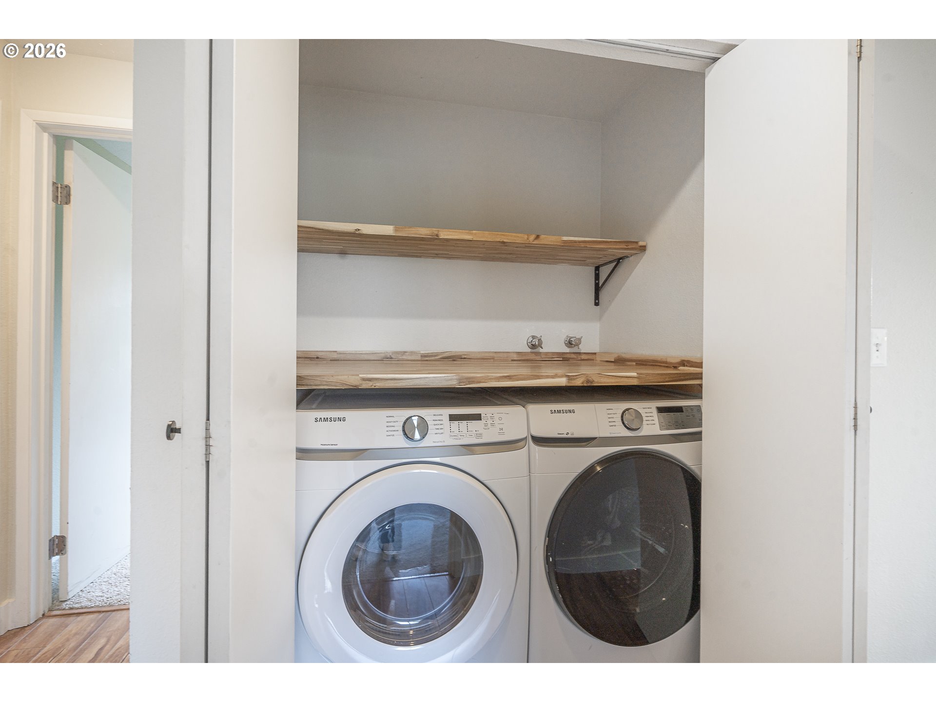 8315 Southwest Shenandoah Way Tualatin, OR 97062 - Photo 13 of 29 a view of washer and dryer in a utility room