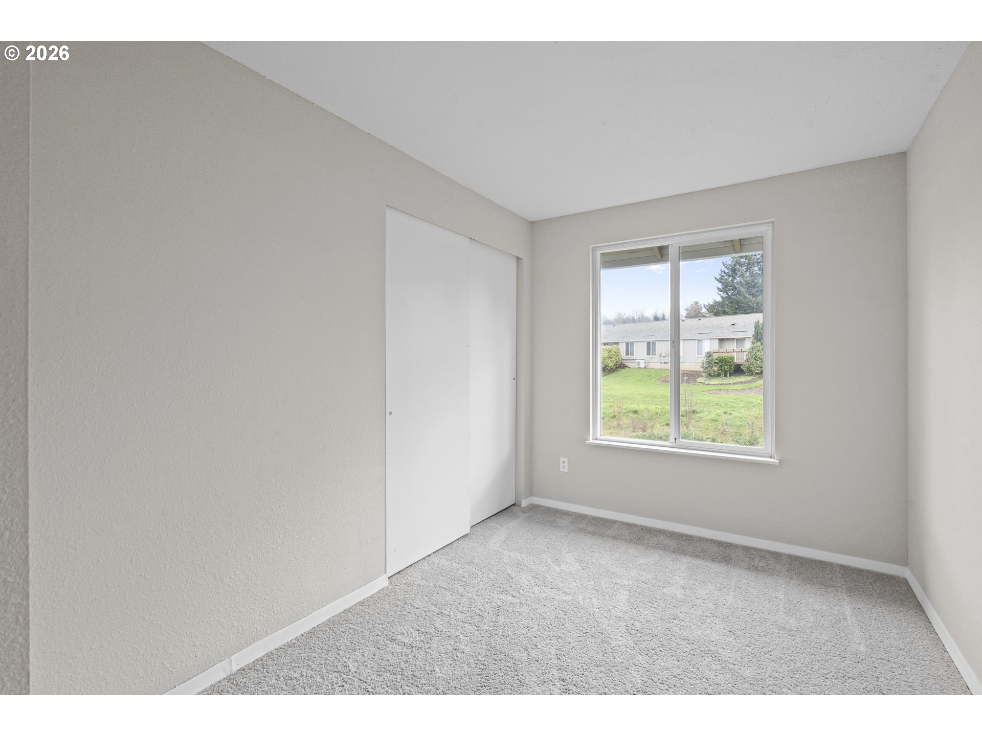 8315 Southwest Shenandoah Way Tualatin, OR 97062 - Photo 14 of 29 an empty room with windows