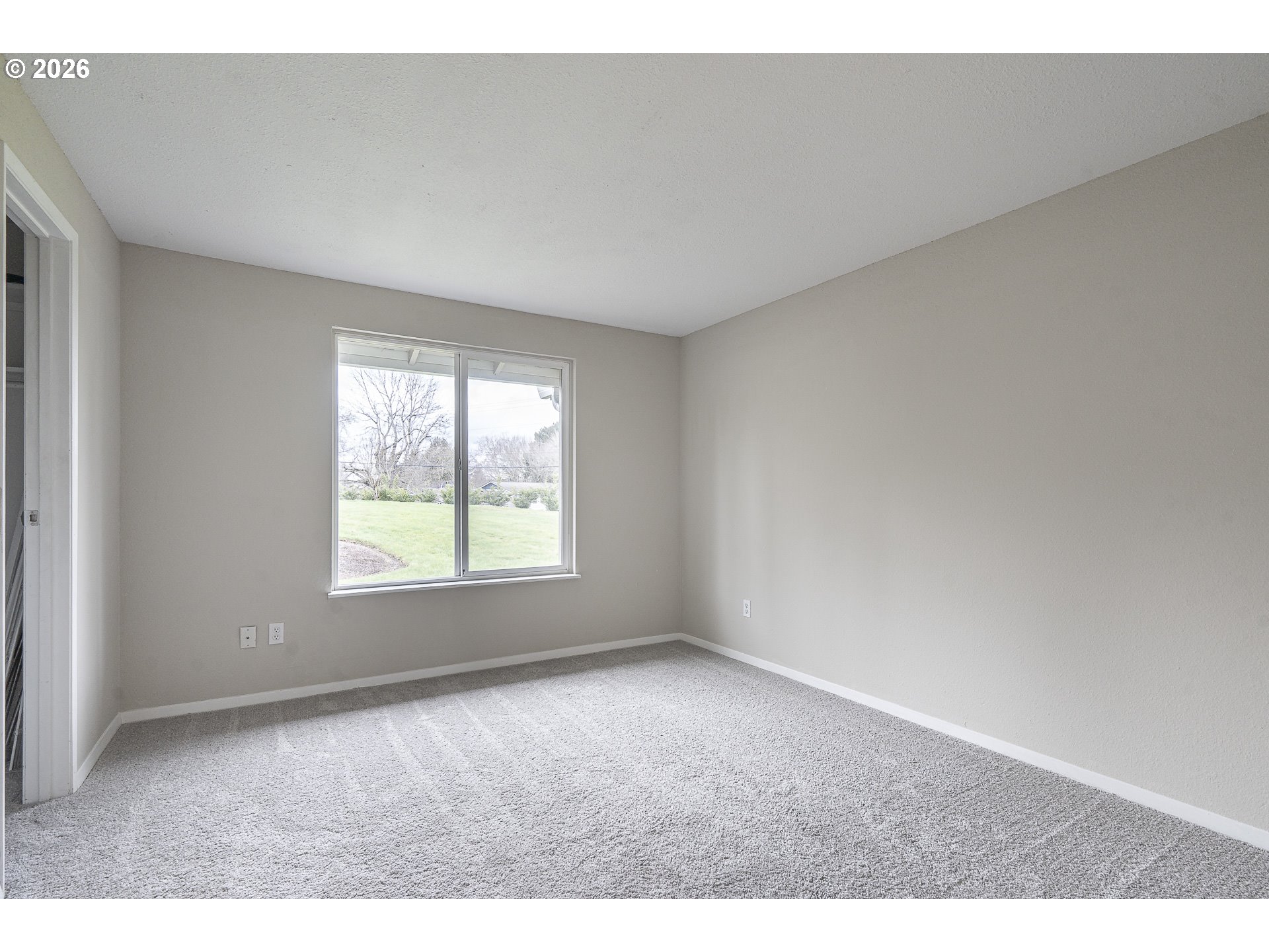 8315 Southwest Shenandoah Way Tualatin, OR 97062 - Photo 18 of 29 a big room with windows and closet