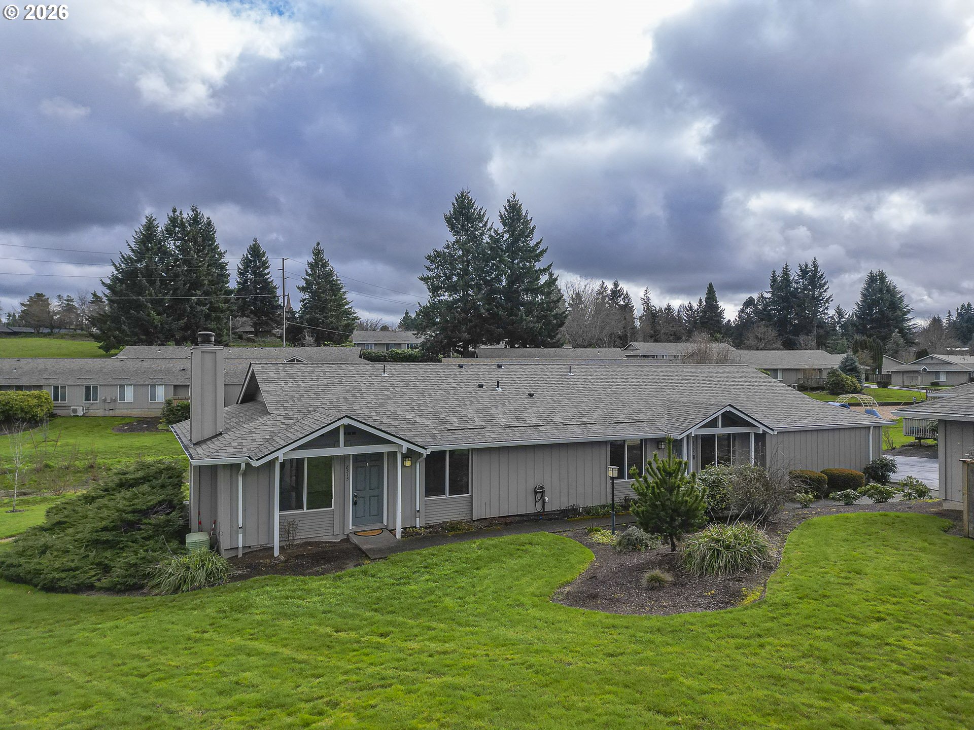 8315 Southwest Shenandoah Way Tualatin, OR 97062 - Photo 2 of 29 a view of a house with a big yard