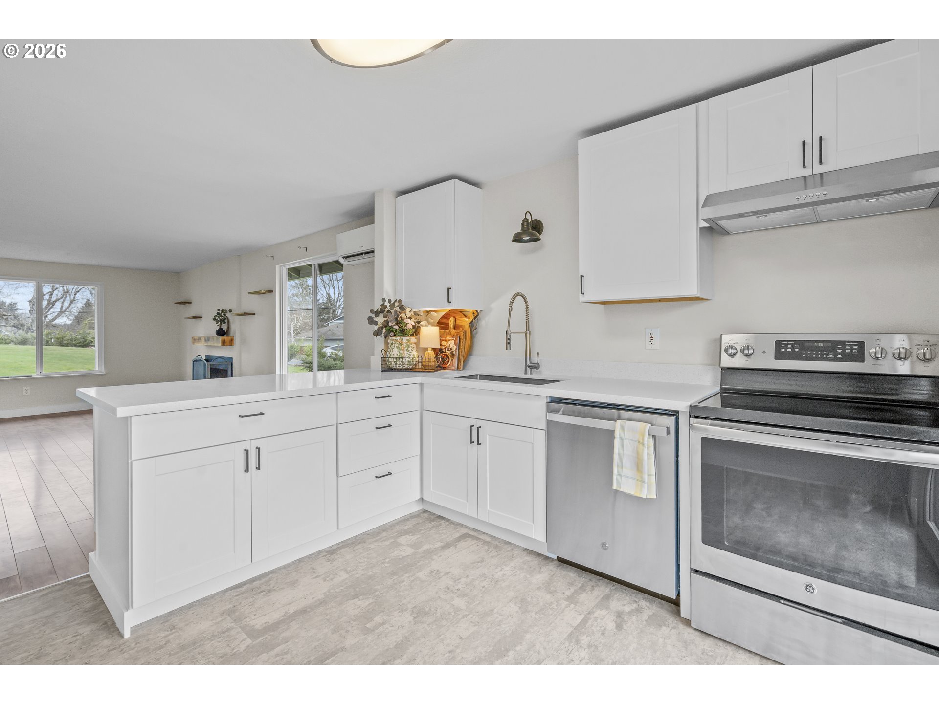 8315 Southwest Shenandoah Way Tualatin, OR 97062 - Photo 9 of 29 a kitchen with cabinets stainless steel appliances and sink