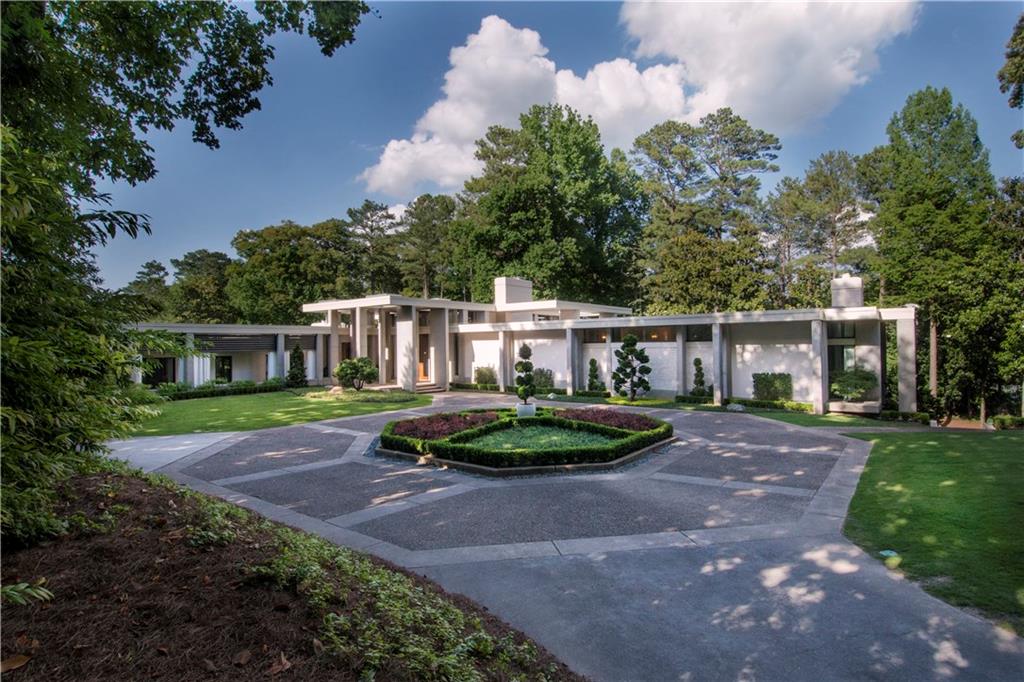 3303 Chatham Road Northwest Atlanta, GA 30305 - Photo 1 of 1 Drive through the gates to breathtaking architecture! Completely brick, stone, and concrete structures. Main motor court and garages are around the back of the residence with extra parking.