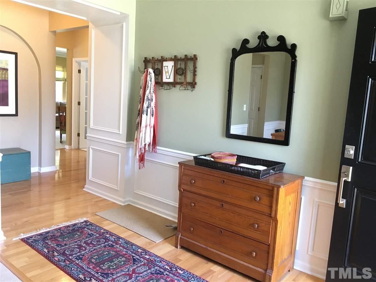 7404 Silver View Lane Raleigh, NC 27613 - Photo 1 of 21 Bright and open foyer with hardwood floors draws you into this beautifully appointed home.