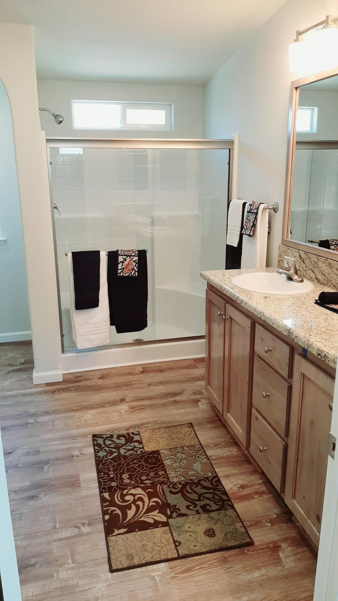 340 Old Mill Road, Unit 18 Santa Barbara, CA 93110 - Photo 11 of 22 a bathroom with a sink and mirror