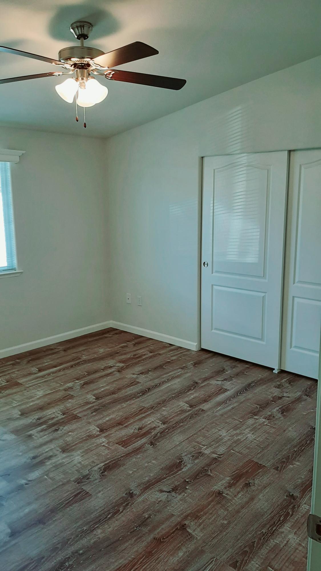 340 Old Mill Road, Unit 18 Santa Barbara, CA 93110 - Photo 16 of 22 a view of empty room with ceiling fan and window