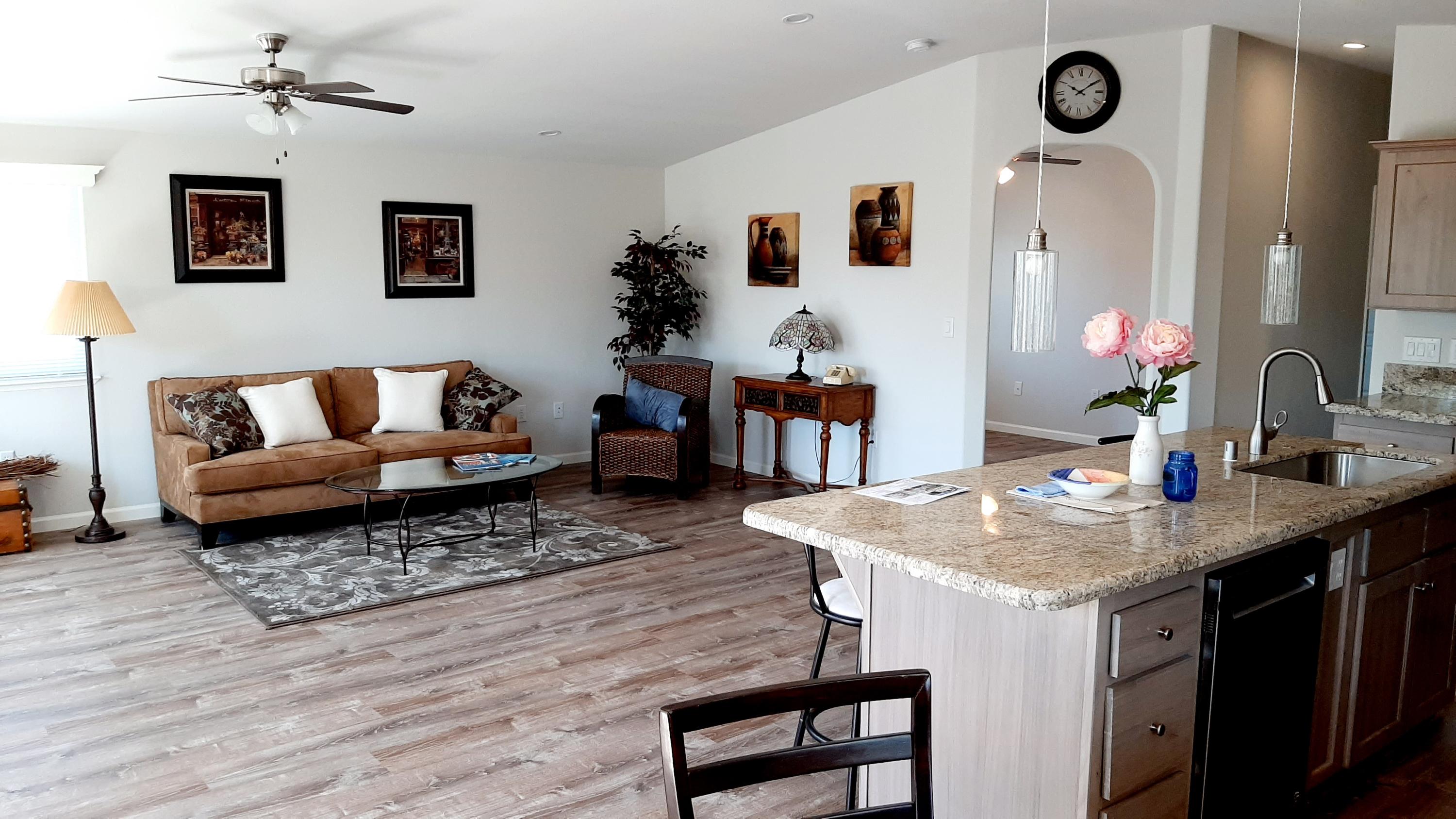 340 Old Mill Road, Unit 18 Santa Barbara, CA 93110 - Photo 6 of 22 a living room with furniture and wooden floor