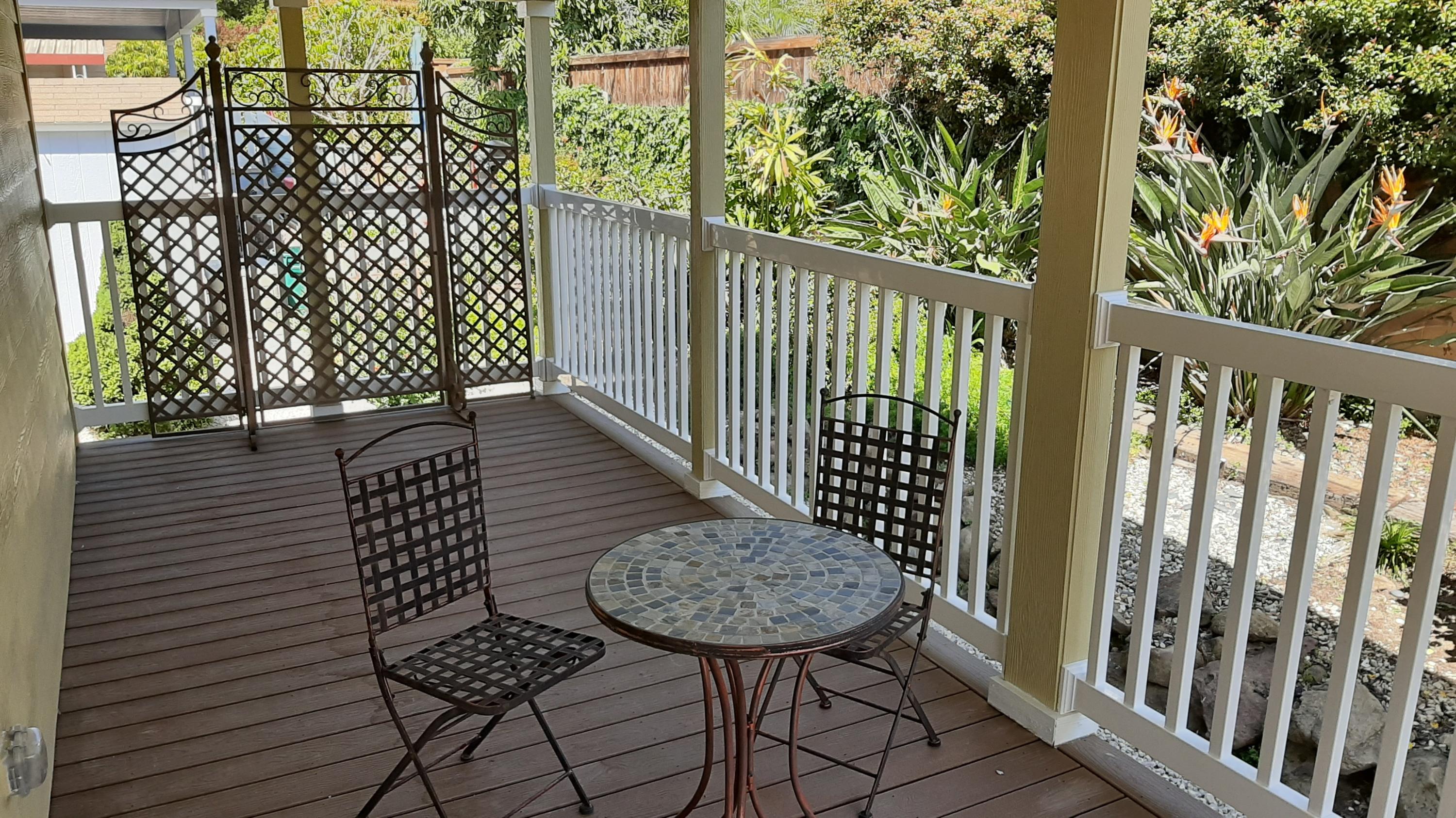 340 Old Mill Road, Unit 18 Santa Barbara, CA 93110 - Photo 10 of 22 a view of a balcony with table and chairs