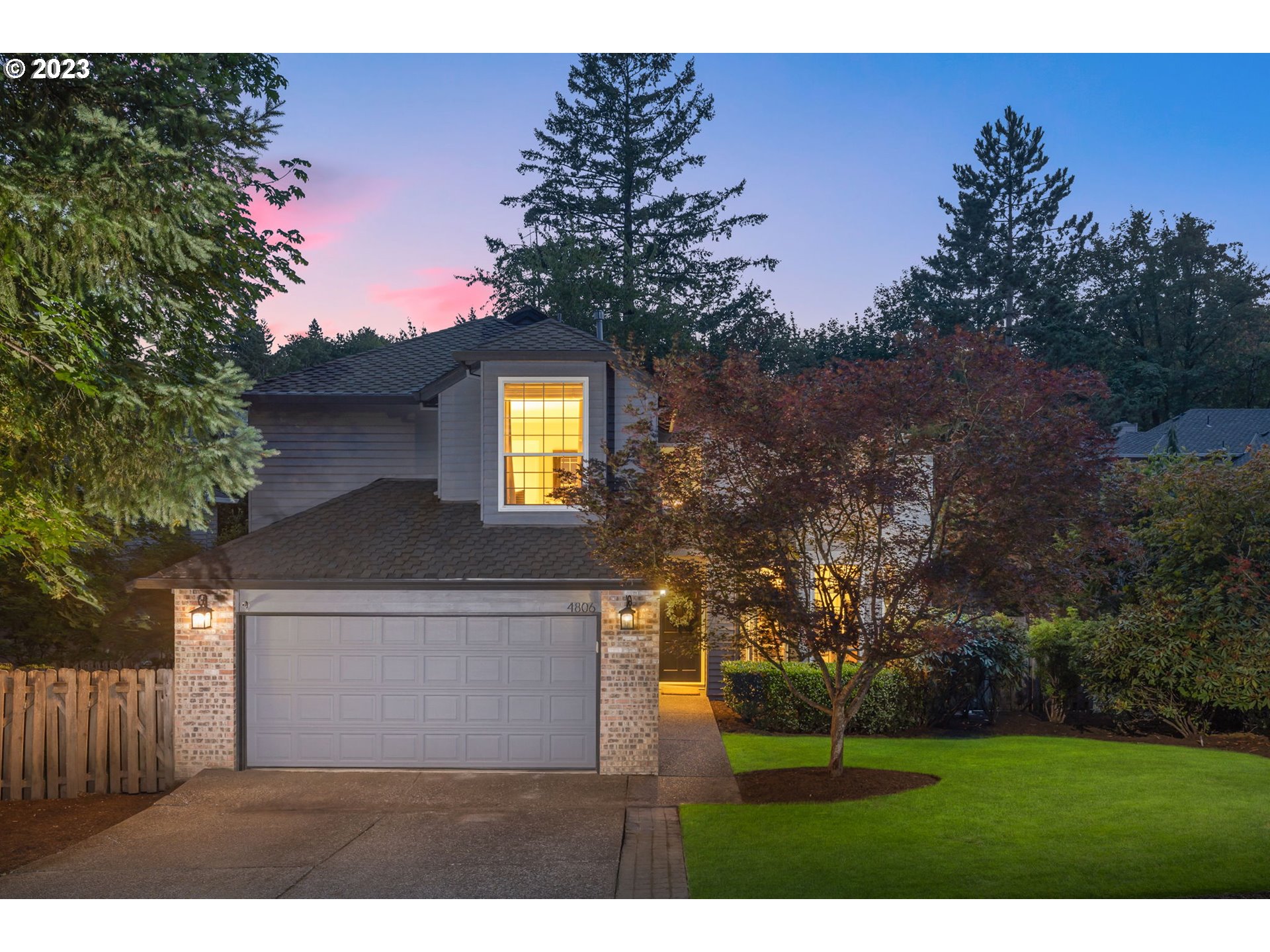 4806 Southwest Orchard Lane Portland, OR 97219 - Photo 1 of 35 a view of a house with a backyard space