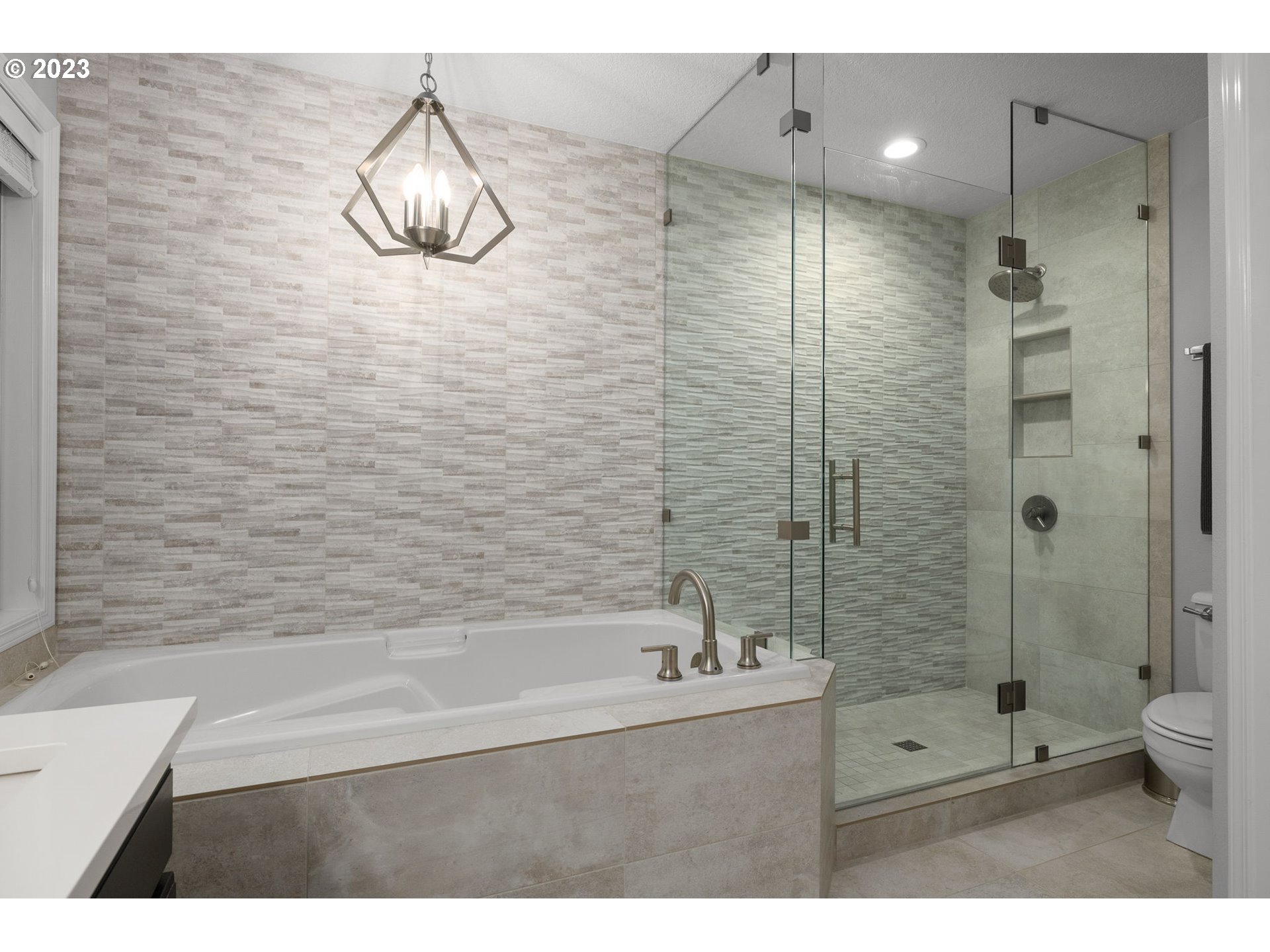 4806 Southwest Orchard Lane Portland, OR 97219 - Photo 22 of 35 a bathroom with a shower a toilet and a sink